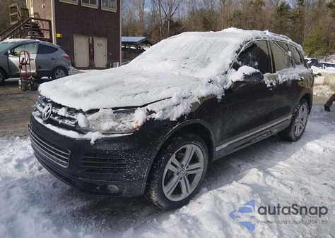 2014 Volkswagen Touareg Tdi R-Line z USA, uszkodzony, nr VIN WVGDP9BP2ED002422